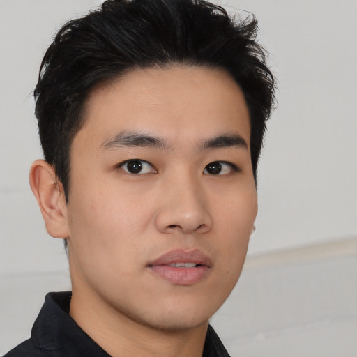 Neutral asian young-adult male with short  black hair and brown eyes