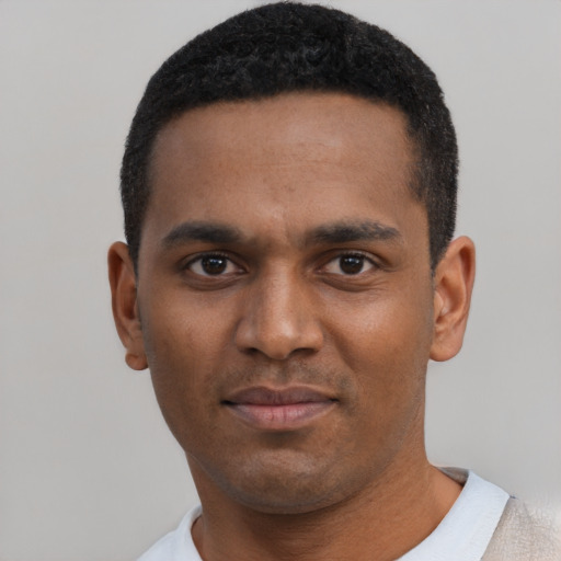 Neutral black young-adult male with short  black hair and brown eyes