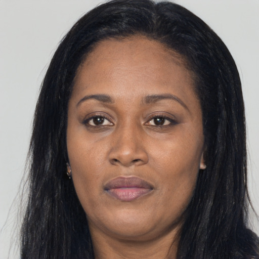 Joyful asian adult female with long  black hair and brown eyes