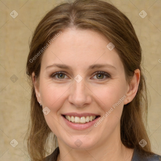 Joyful white young-adult female with medium  brown hair and green eyes