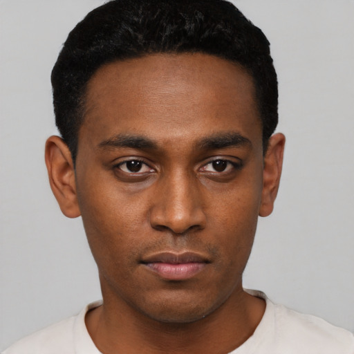 Neutral black young-adult male with short  black hair and brown eyes