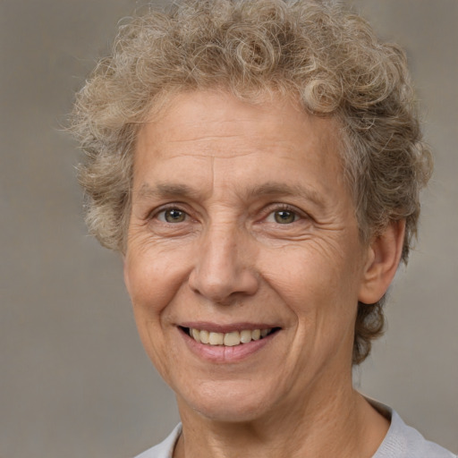 Joyful white middle-aged female with short  brown hair and brown eyes