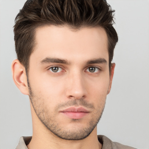 Neutral white young-adult male with short  brown hair and brown eyes