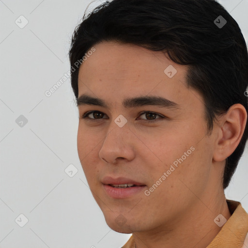 Joyful white young-adult male with short  black hair and brown eyes