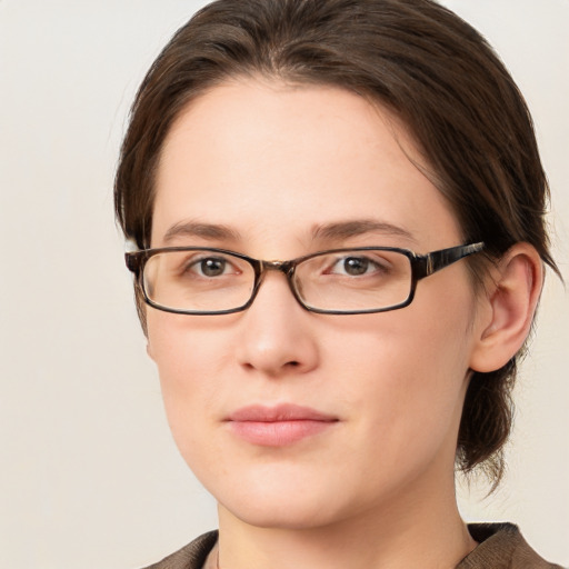 Neutral white young-adult female with medium  brown hair and grey eyes