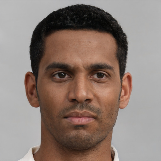 Neutral black young-adult male with short  black hair and brown eyes