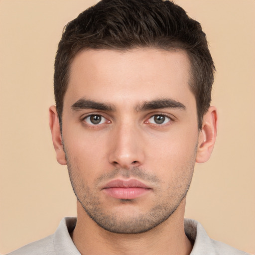 Neutral white young-adult male with short  brown hair and brown eyes