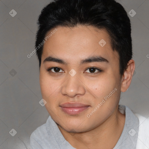 Joyful latino young-adult male with short  brown hair and brown eyes