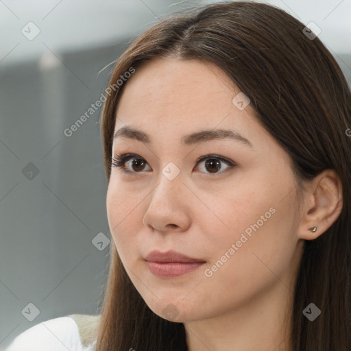 Neutral white young-adult female with long  brown hair and brown eyes