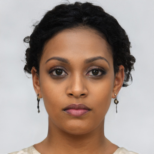 Neutral latino young-adult female with short  black hair and brown eyes