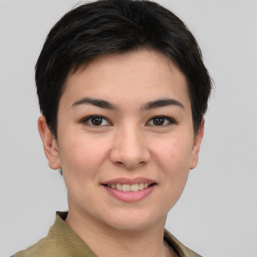 Joyful white young-adult female with short  brown hair and brown eyes