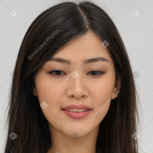 Joyful asian young-adult female with long  brown hair and brown eyes