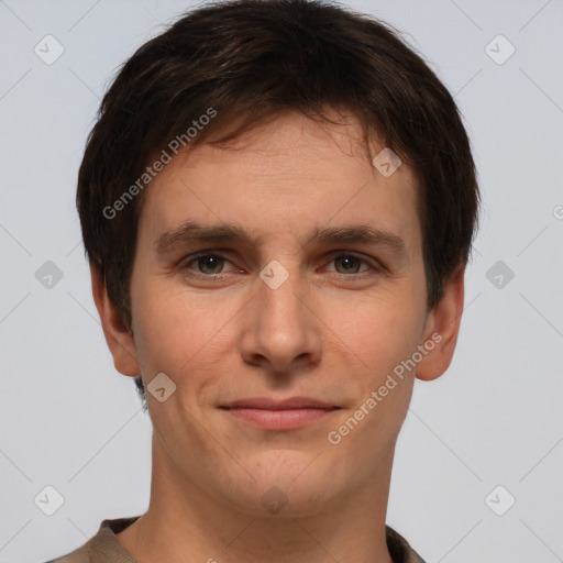 Joyful white young-adult male with short  brown hair and brown eyes