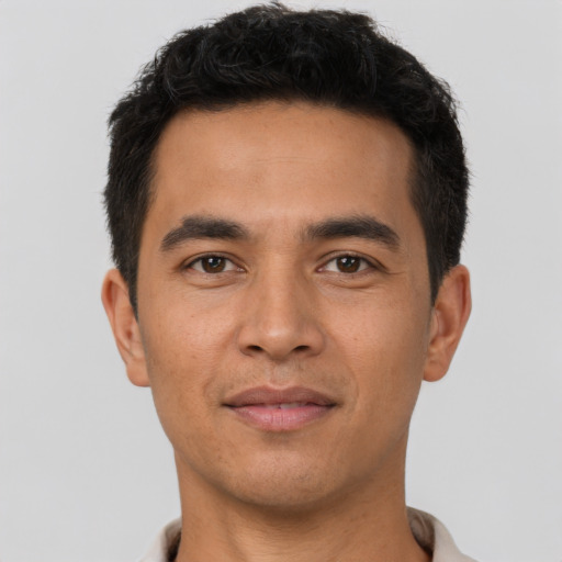 Neutral asian young-adult male with short  brown hair and brown eyes