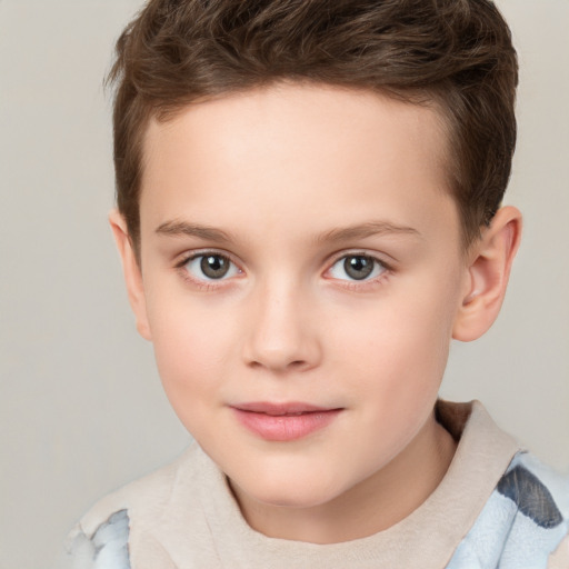 Joyful white child female with short  brown hair and brown eyes