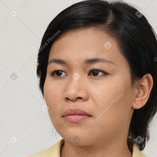 Neutral asian young-adult female with medium  black hair and brown eyes