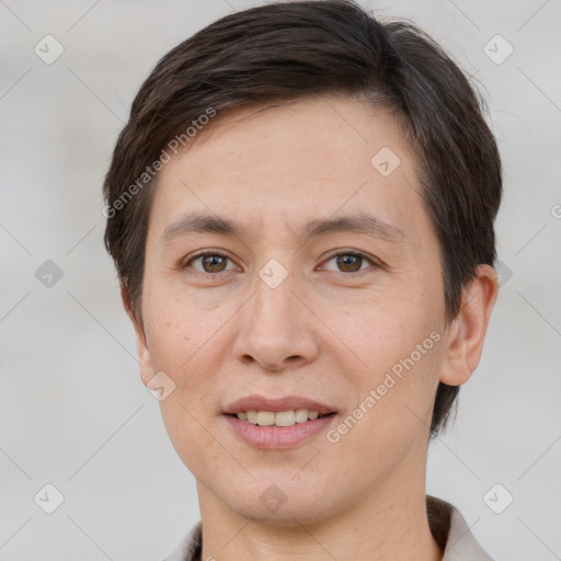 Joyful white young-adult female with short  brown hair and brown eyes