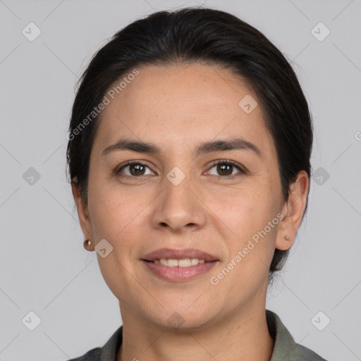 Joyful white adult female with short  brown hair and brown eyes