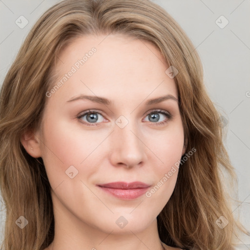 Joyful white young-adult female with long  brown hair and blue eyes