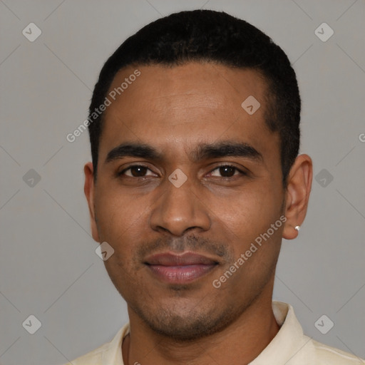 Joyful black young-adult male with short  black hair and brown eyes