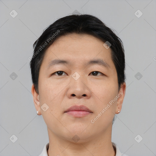 Neutral asian young-adult male with short  black hair and brown eyes