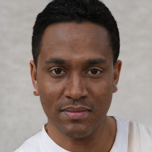 Neutral black young-adult male with short  black hair and brown eyes