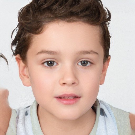 Joyful white child female with short  brown hair and brown eyes