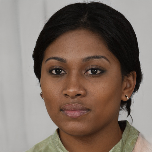 Neutral asian young-adult female with medium  black hair and brown eyes