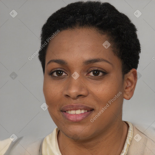 Joyful black young-adult female with short  brown hair and brown eyes