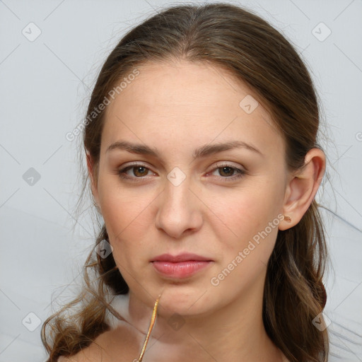 Joyful white young-adult female with long  brown hair and grey eyes