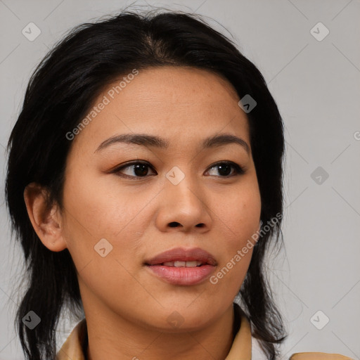 Joyful asian young-adult female with medium  black hair and brown eyes