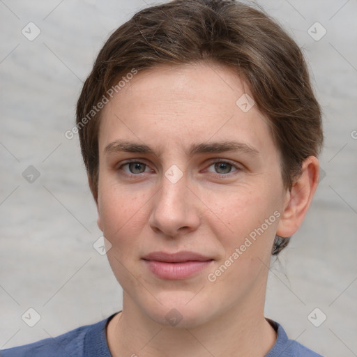 Joyful white young-adult female with short  brown hair and grey eyes