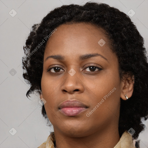 Neutral black young-adult female with long  black hair and brown eyes