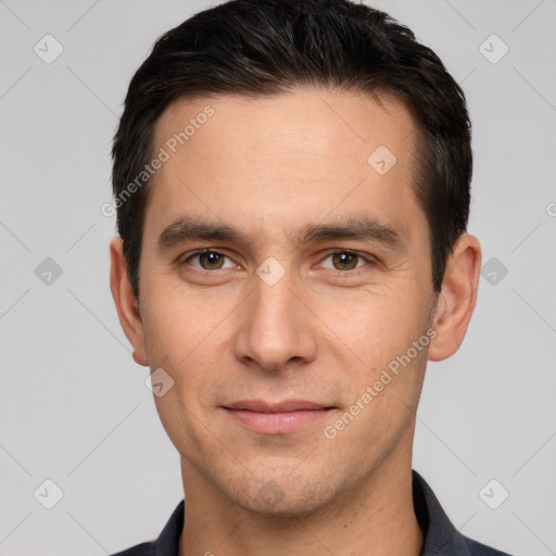 Joyful white young-adult male with short  brown hair and brown eyes