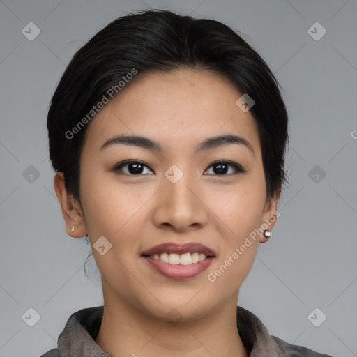 Joyful asian young-adult female with medium  black hair and brown eyes