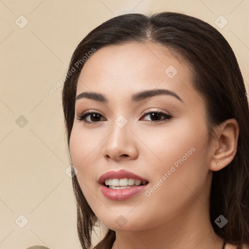 Joyful white young-adult female with long  black hair and brown eyes