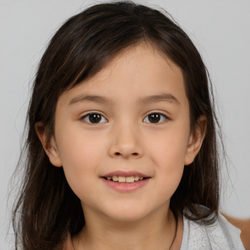 Joyful white child female with medium  brown hair and brown eyes