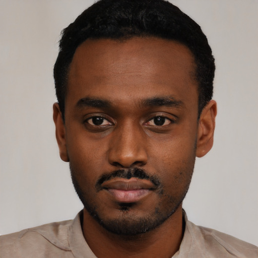 Neutral black young-adult male with short  black hair and brown eyes