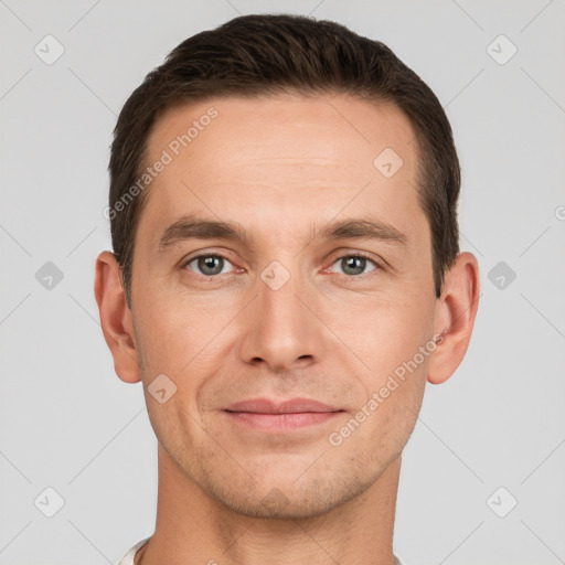 Joyful white young-adult male with short  brown hair and brown eyes