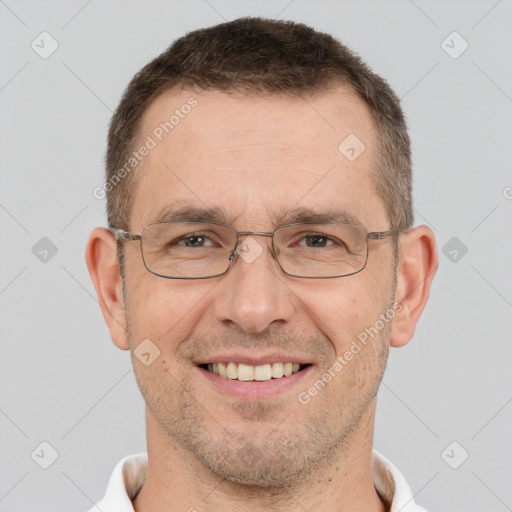 Joyful white adult male with short  brown hair and brown eyes