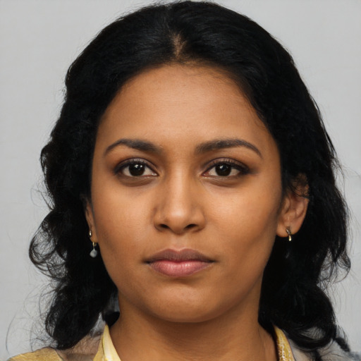 Neutral latino young-adult female with long  black hair and brown eyes