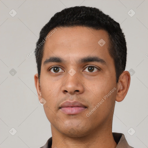 Neutral latino young-adult male with short  black hair and brown eyes