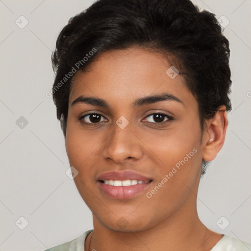 Joyful latino young-adult female with short  brown hair and brown eyes