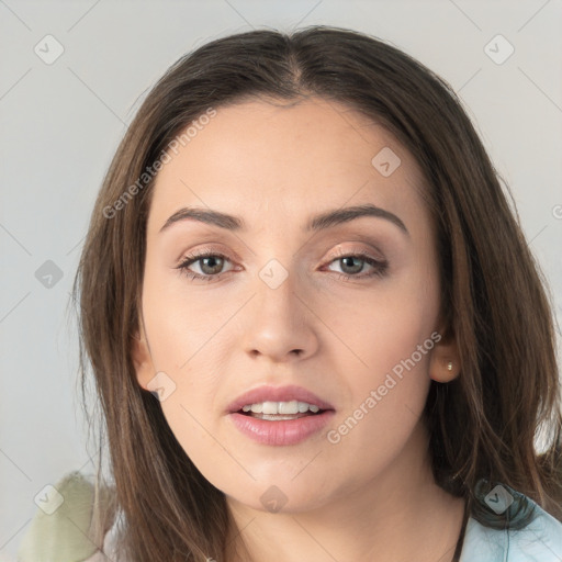 Neutral white young-adult female with long  brown hair and brown eyes