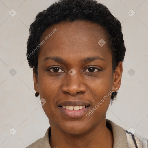 Joyful black young-adult female with short  black hair and brown eyes