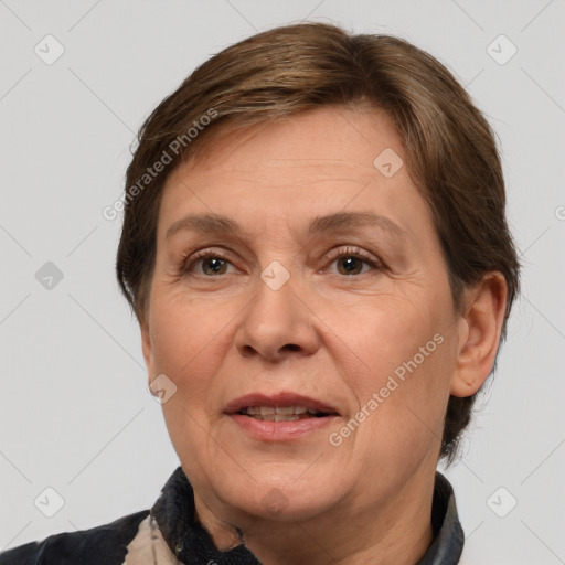 Joyful white adult female with medium  brown hair and grey eyes