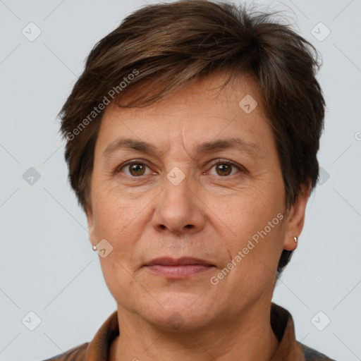 Joyful white adult female with short  brown hair and brown eyes