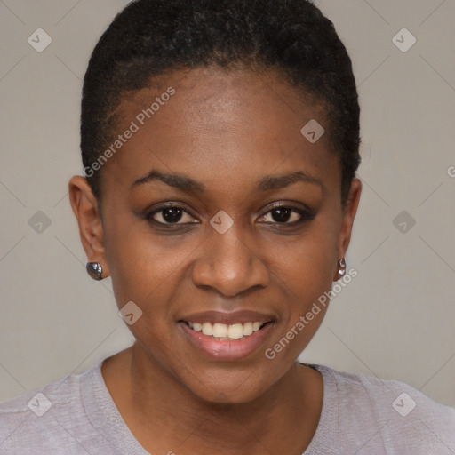 Joyful black young-adult female with short  brown hair and brown eyes