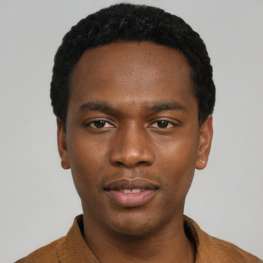 Neutral black young-adult male with short  black hair and brown eyes