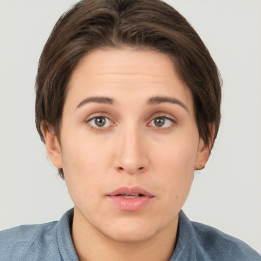 Neutral white young-adult female with short  brown hair and brown eyes